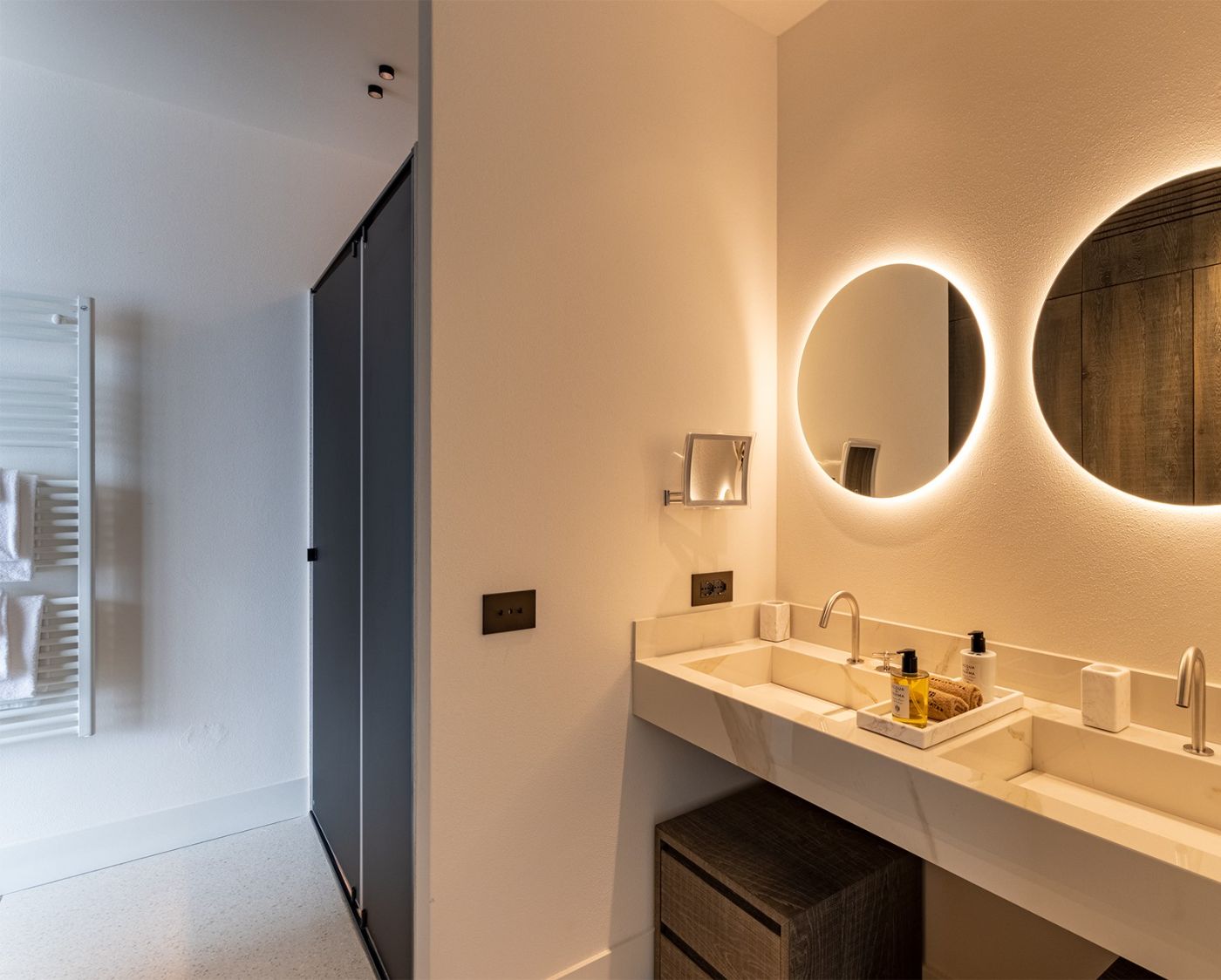A bathroom with twin basins at luxury private villa rental, Breakwater Bellagio, Lake Como