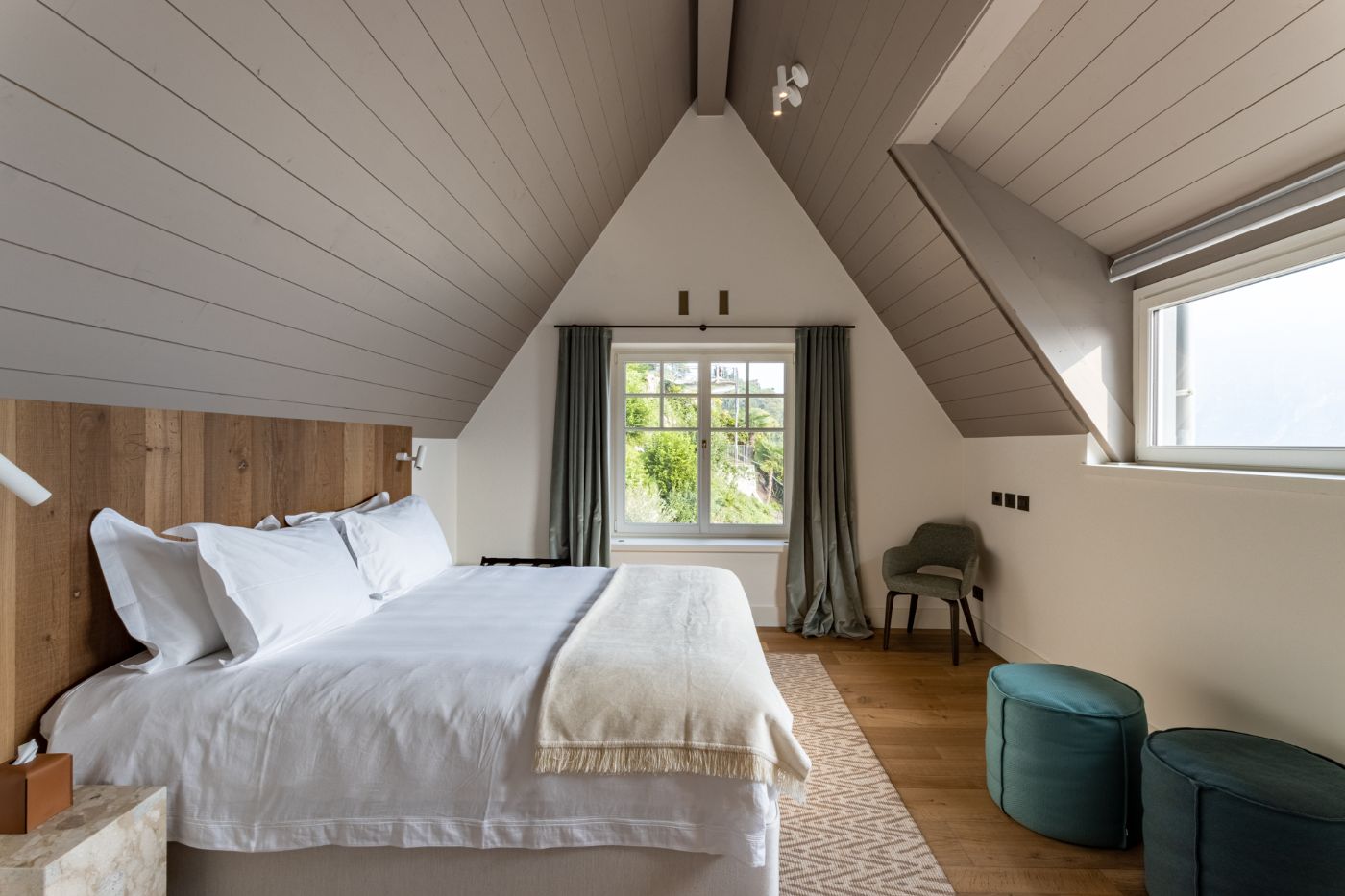 A fourth bedroom with sloping ceilings at luxury vacation rental Breakwater Bellagio, Lake Como