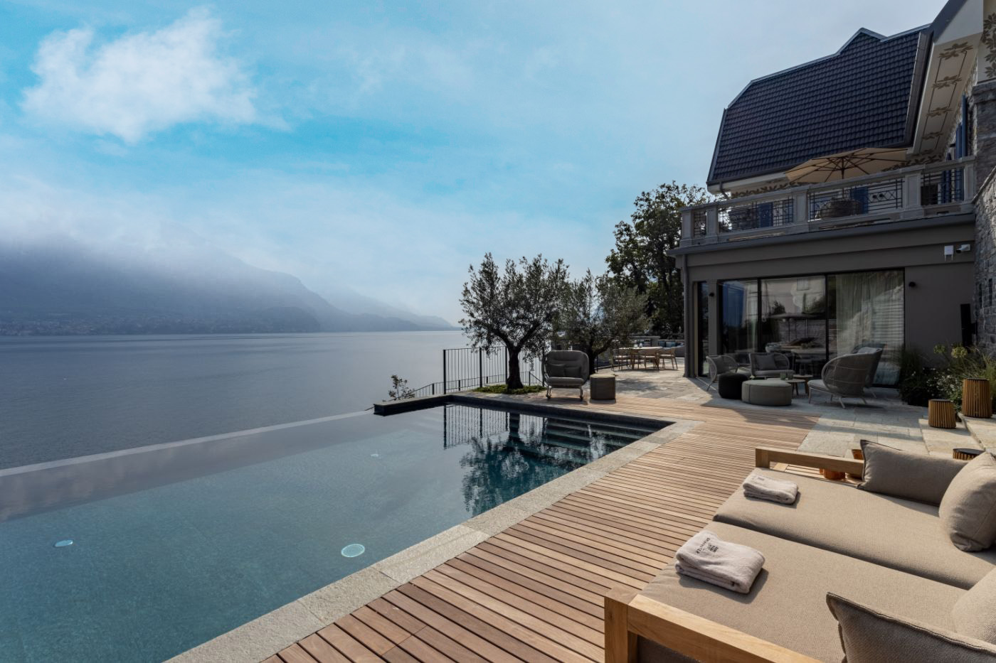 Sun terrace and inifinity pool with lake views at luxury vacation rental, Breakwater Bellagio, Lake Como