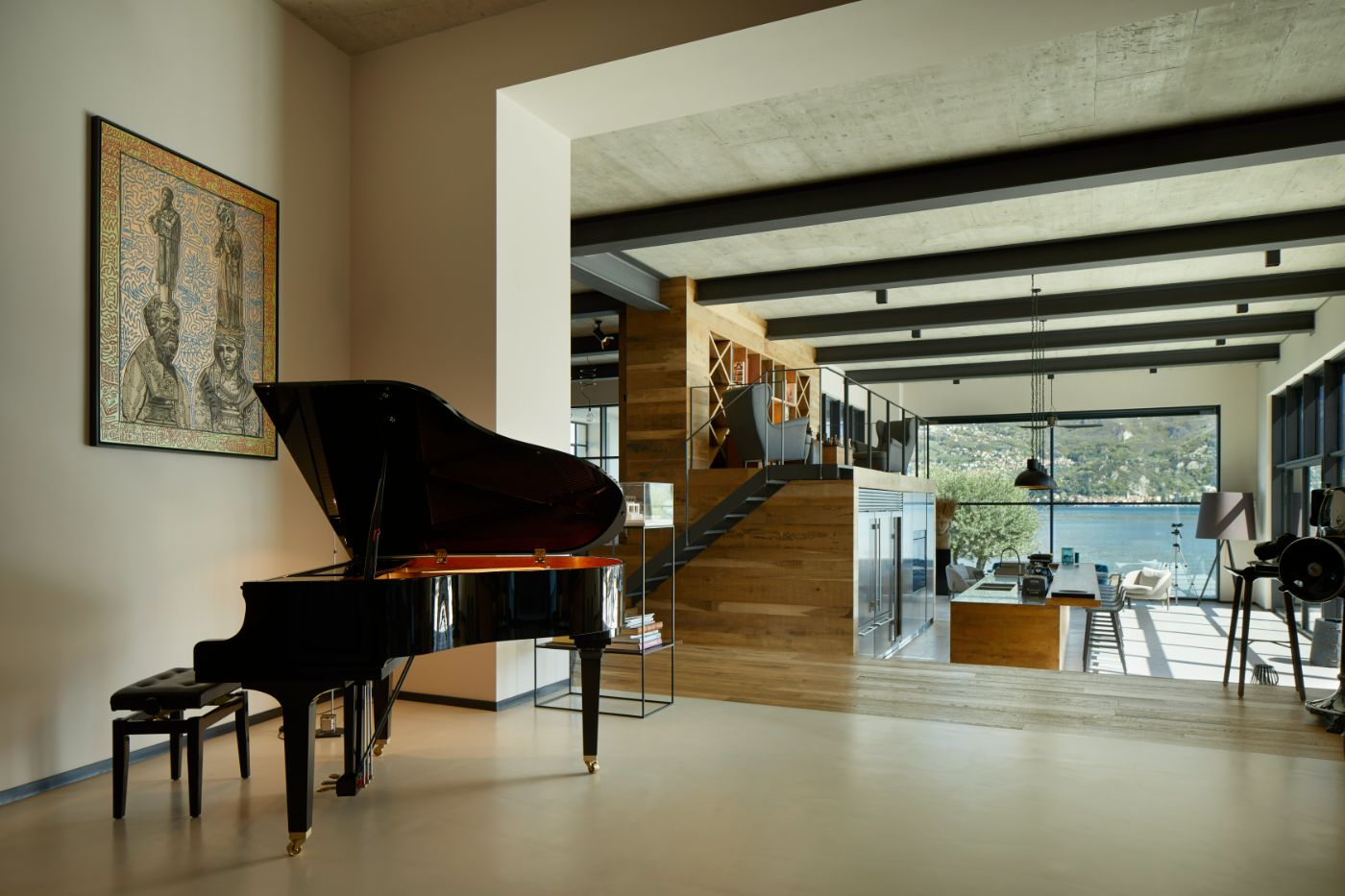 The interior of the Breakwater featuring the villa's baby-grand piano.