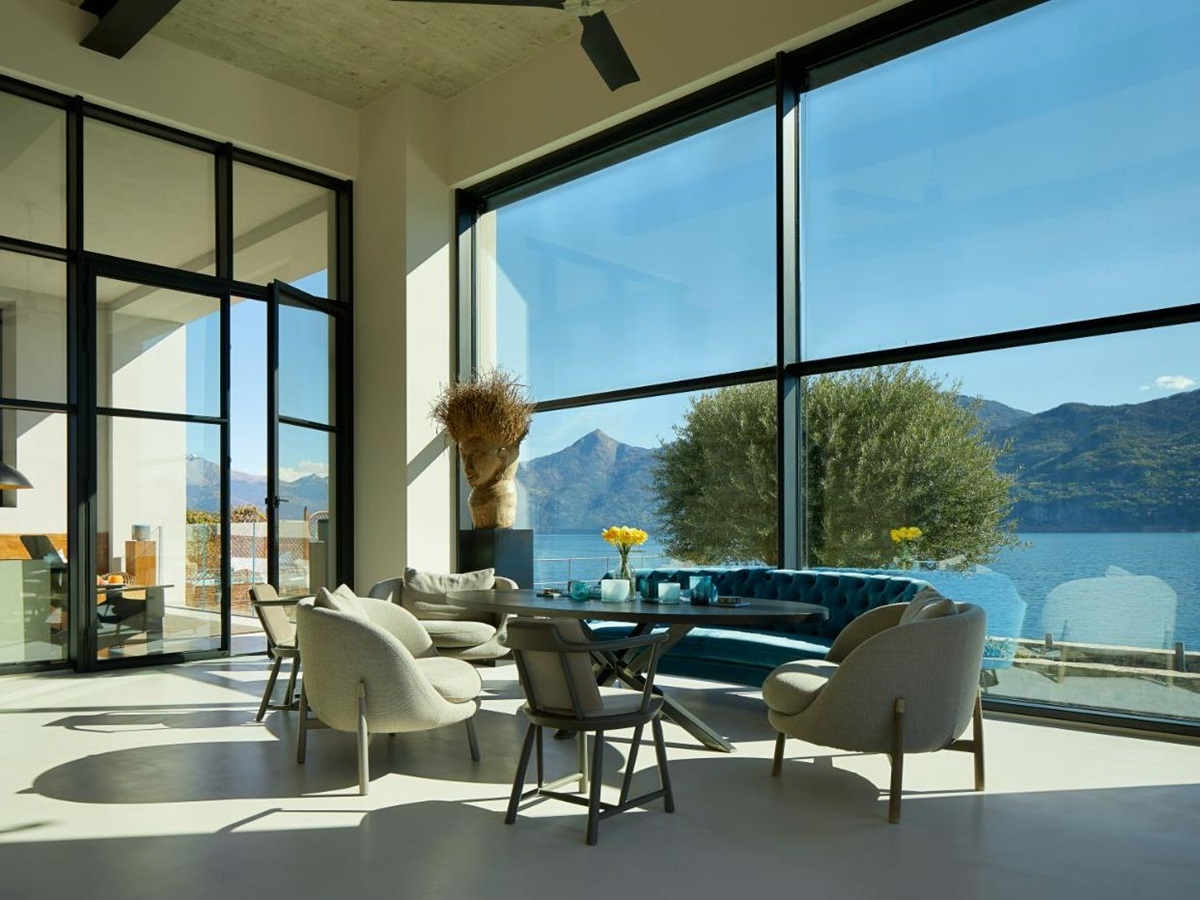 A shot of the interior of the Breakwater, including a view of Lake Como through the large windows.