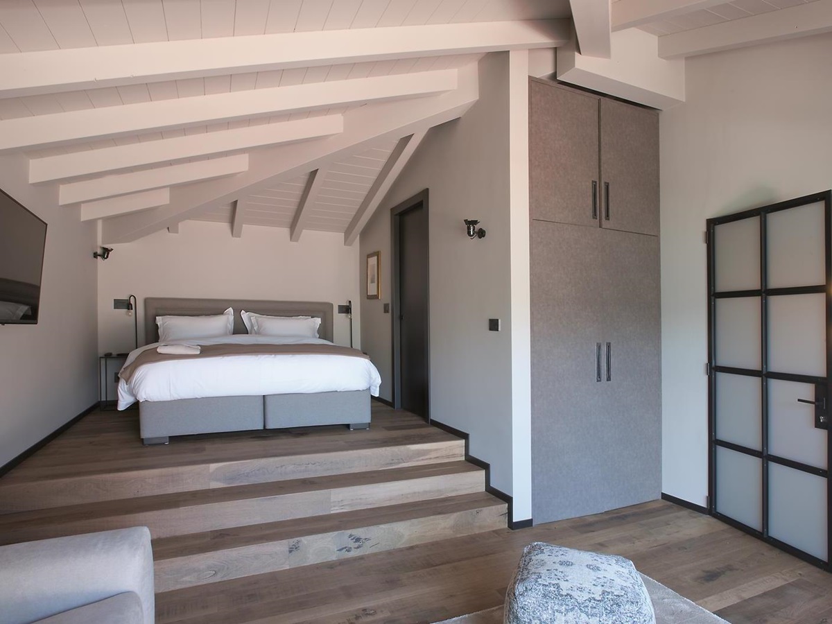 A double bedroom in the Boat House at Lake Como, Italy