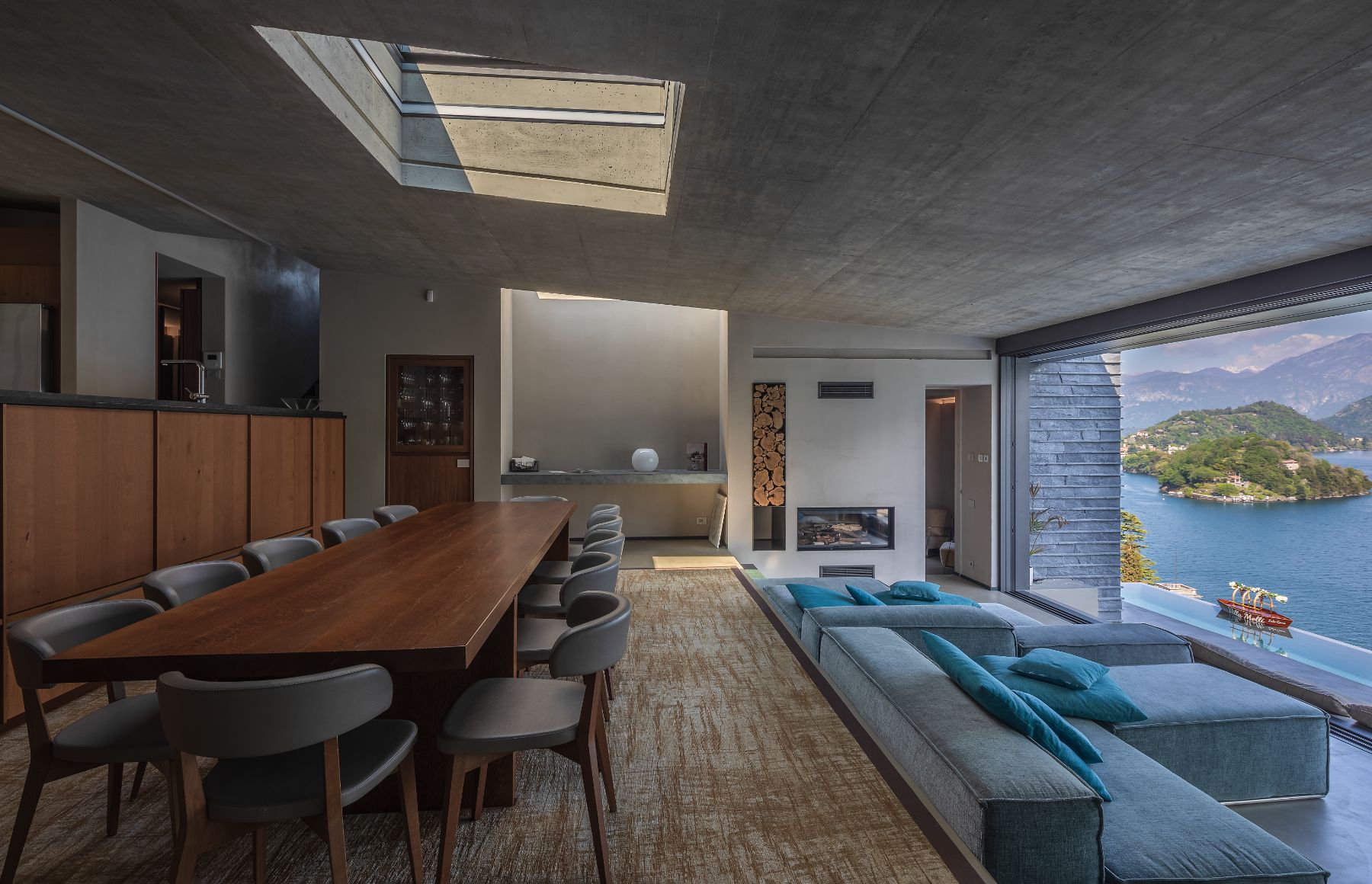 Dining and living area with lake view at Villa Ardesia in Lake Como