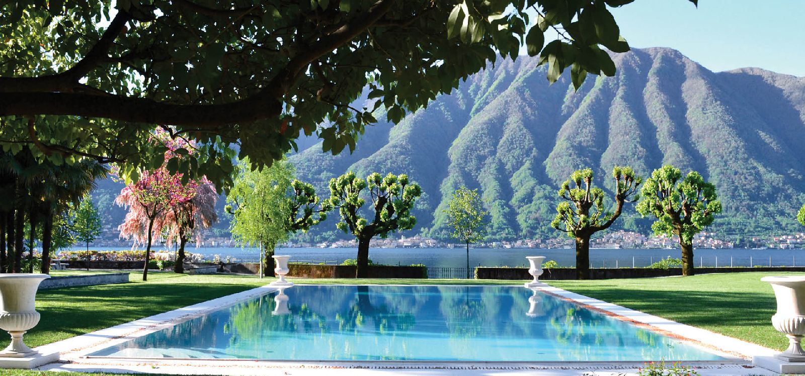 Outdoor heated pool with lake views at Villa Balbiano Lake Como Italy