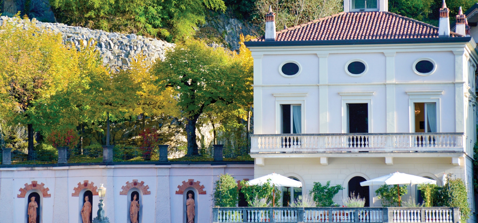 Exterior of Villa Maria Serena and balcony at Ville del Lago on Lake Como, Italy