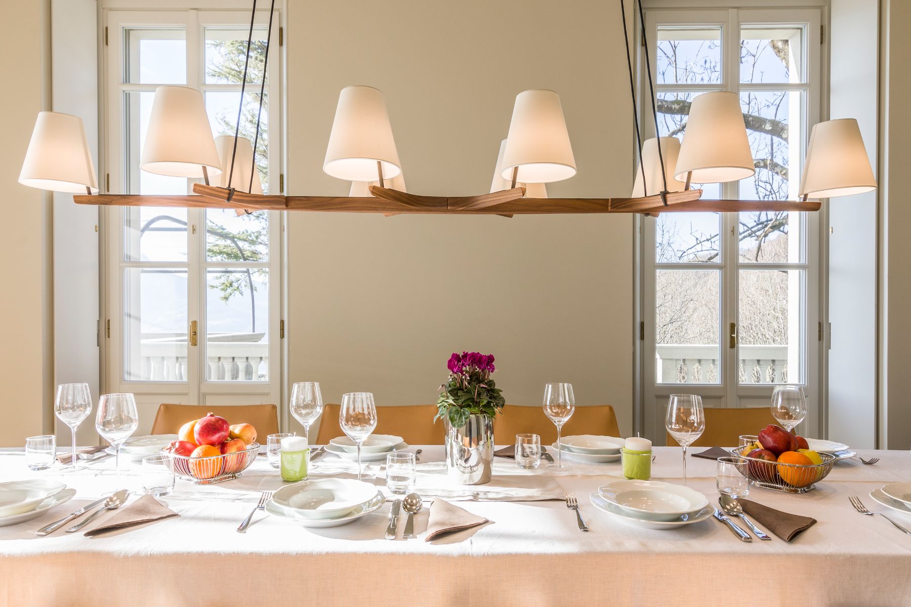 Dining table with bowls of fruit at Villa Della Vetta in Tuscany