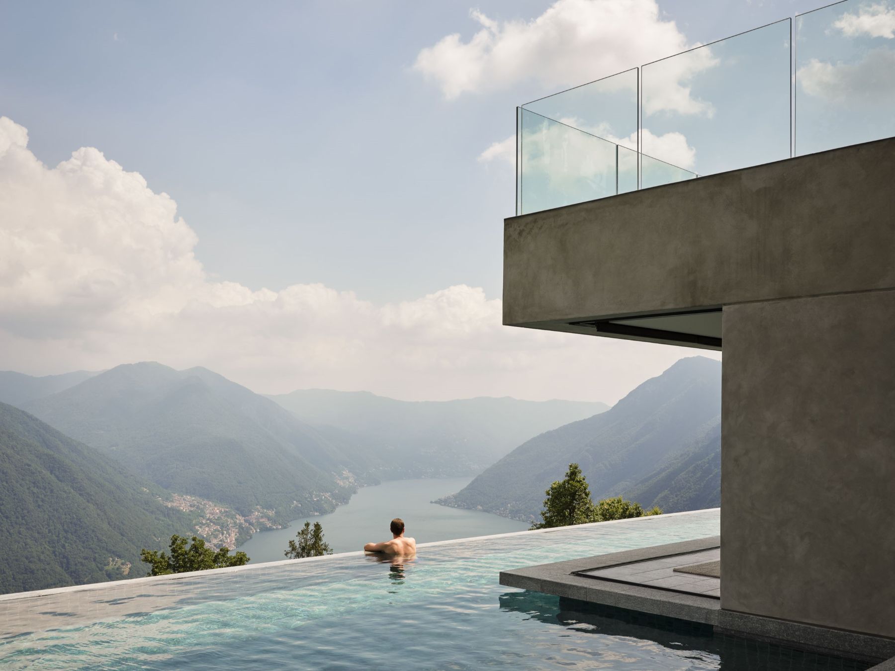 Outdoor infinity pool with views overlooking Lake Como at Villa Della Vetta
