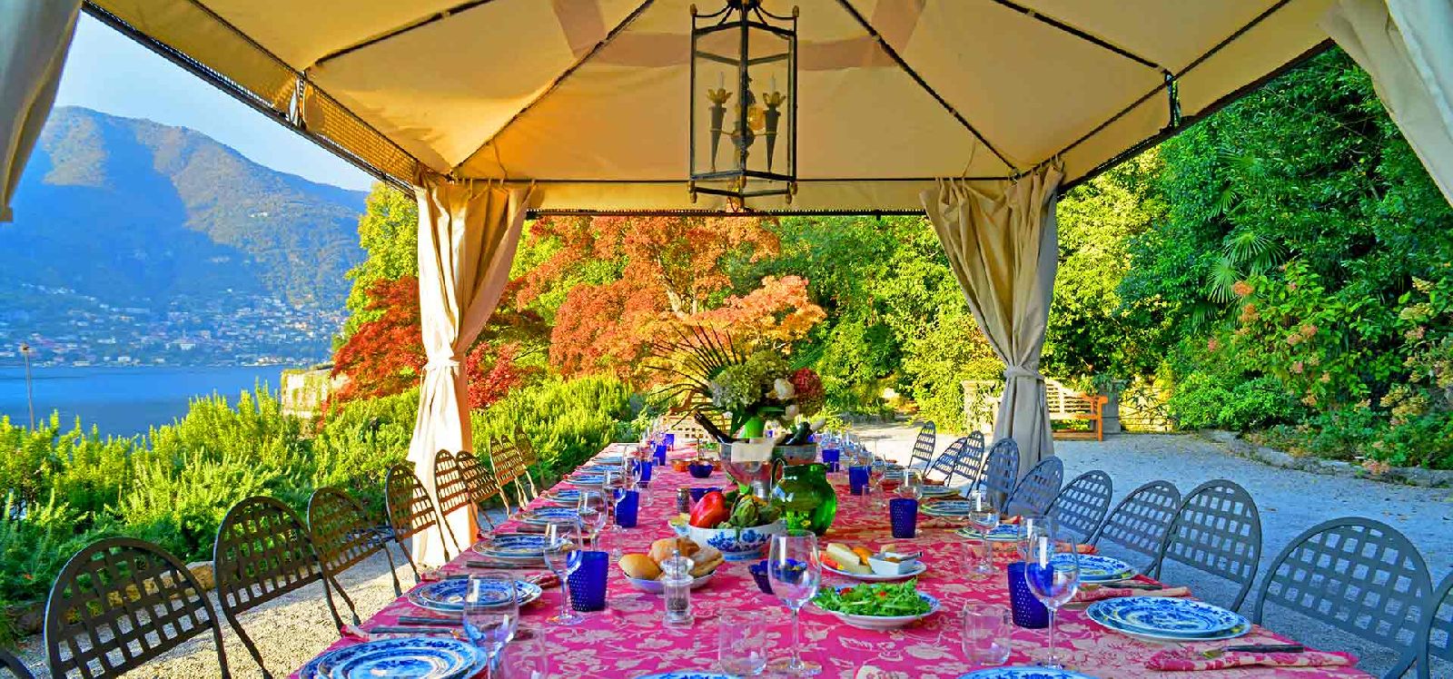 Outdoor dining table with view at Villa Maria Taglioni on the Italian Lakes