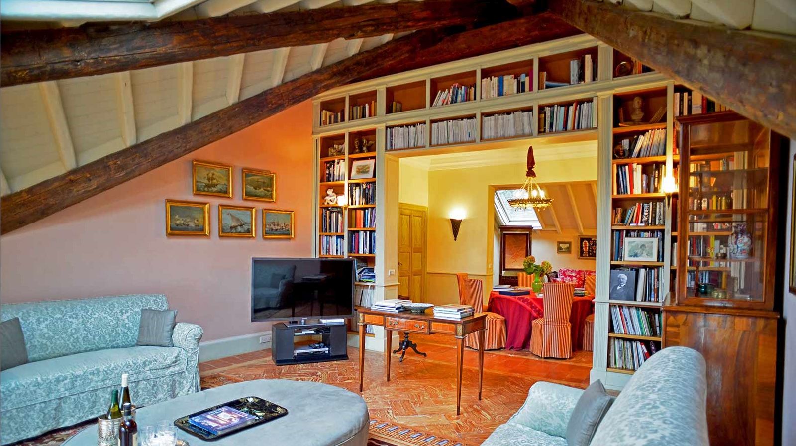Sitting room with large bookcases at Villa Maria Taglioni on the Italian Lakes