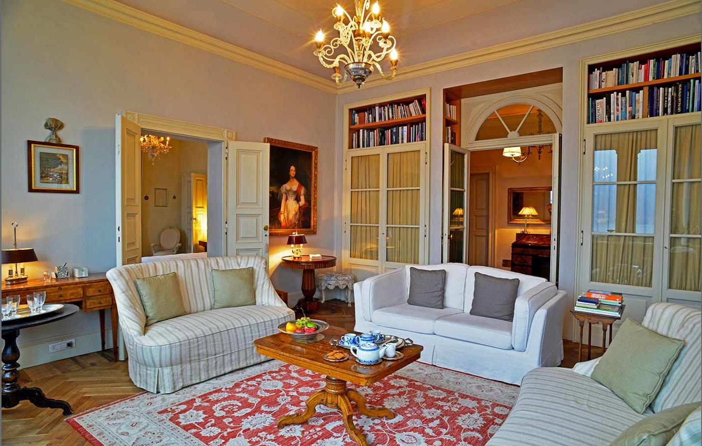 Living room with white sofas at Villa Maria Taglioni on the Italian Lakes