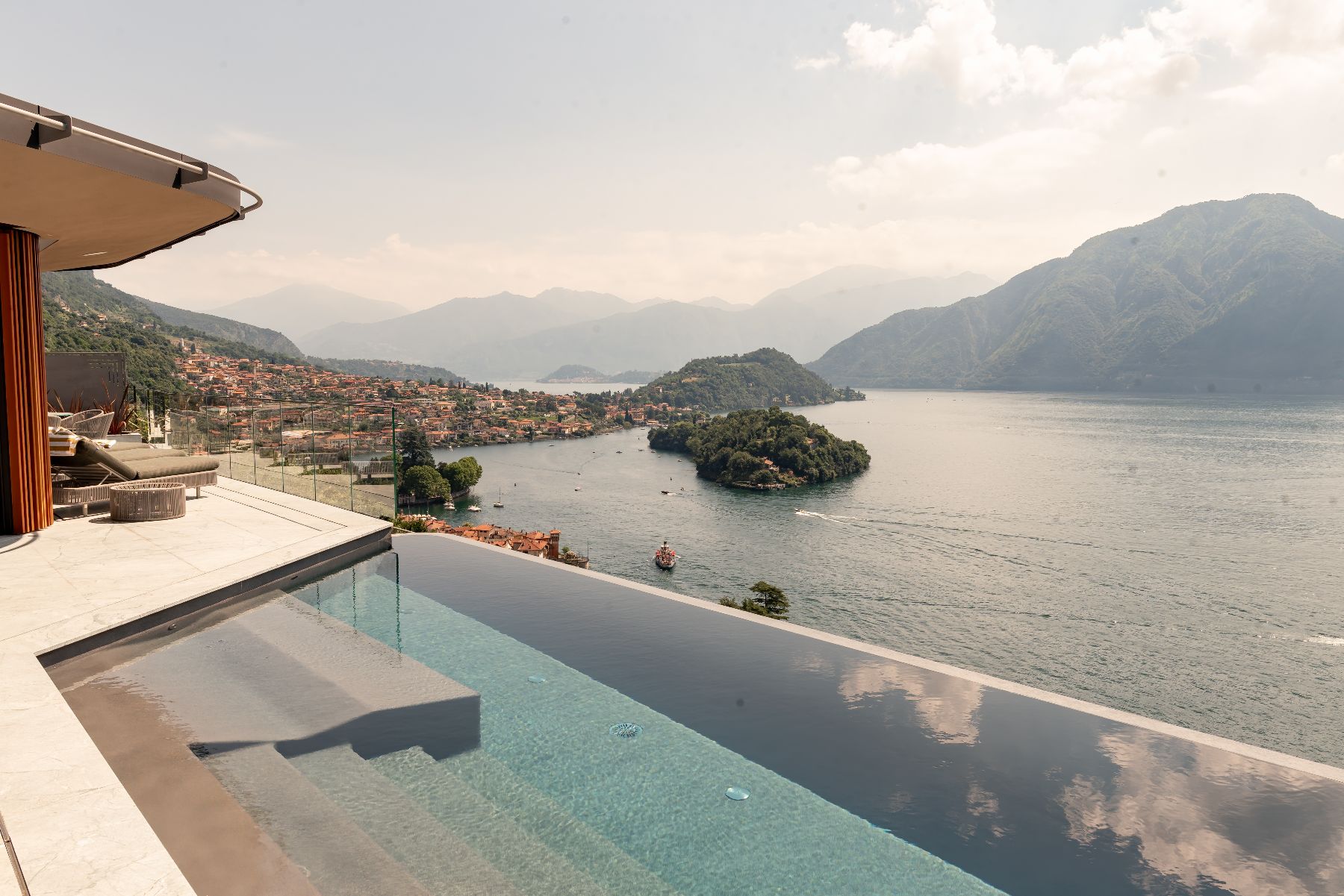 Pool and lake view at Villa Orizzonte in Lake Como