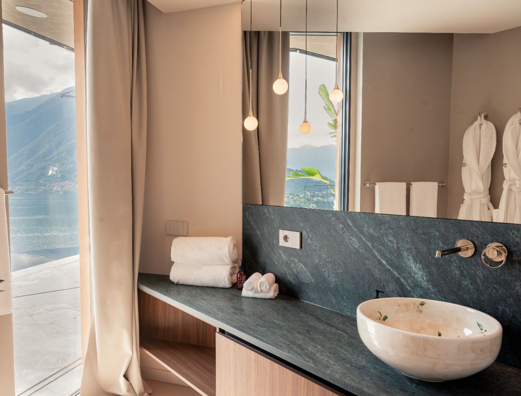Bathroom sink and view at Villa Orizzonte in Lake Como