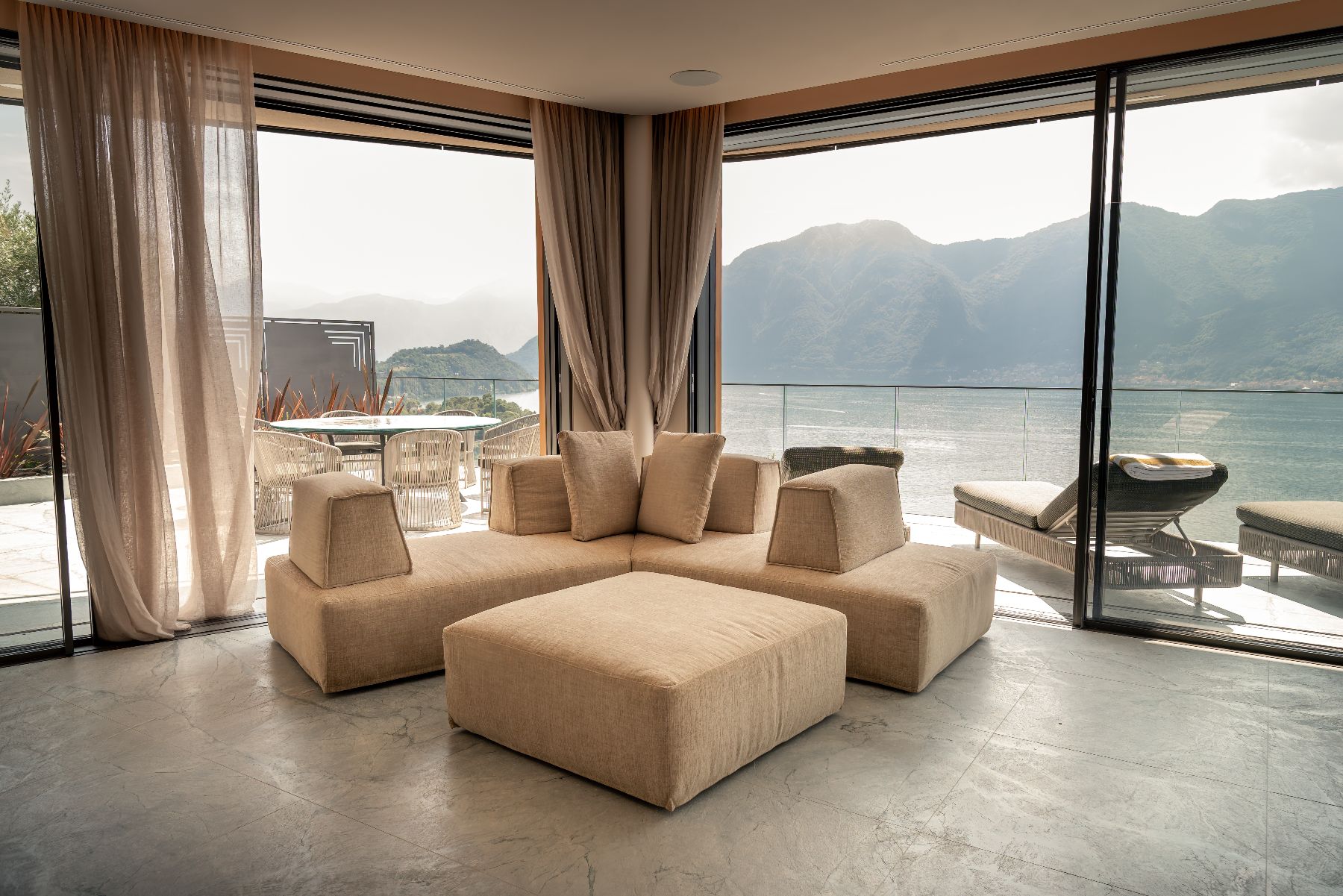 Sofa and lake view at Villa Orizzonte in Lake Como