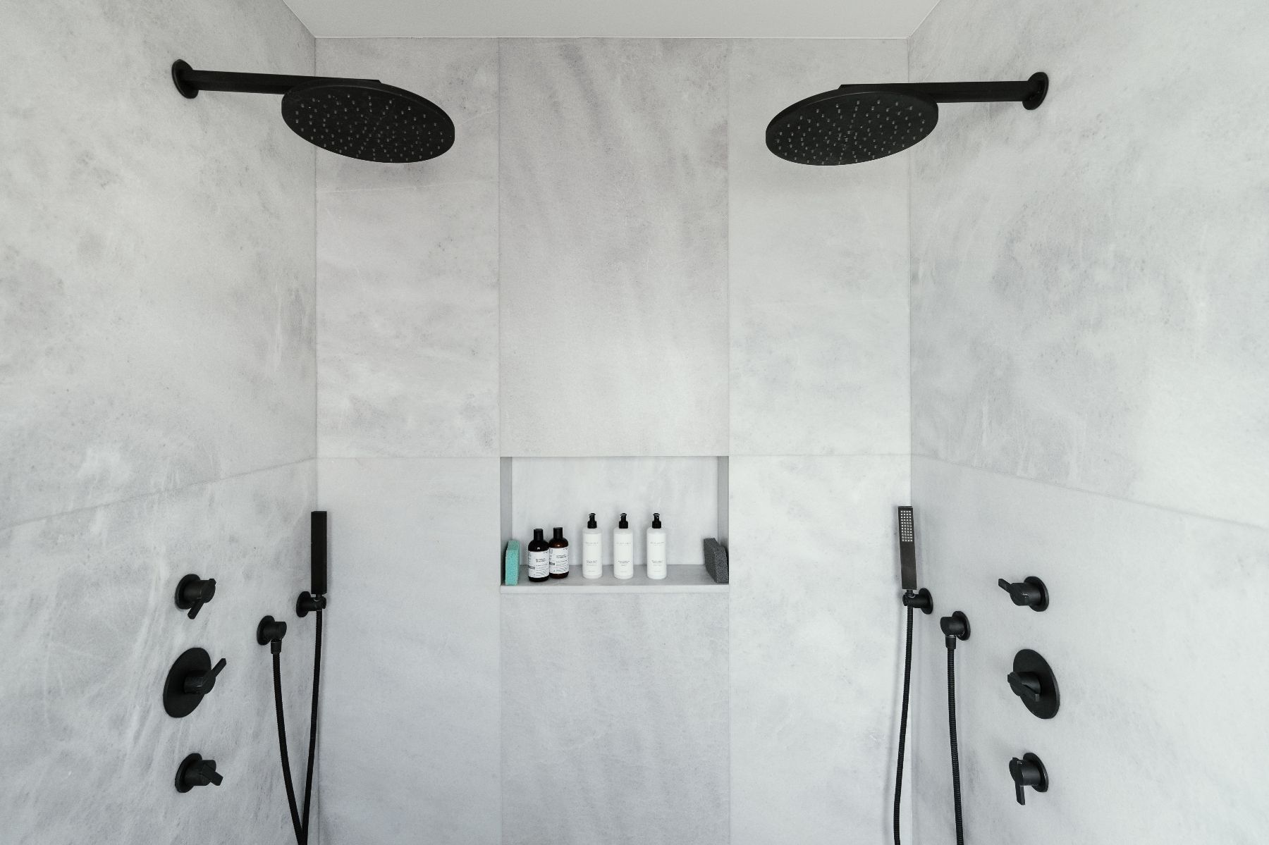 Twin shower with marble walls at Villa Pola on Lake Como, Italy