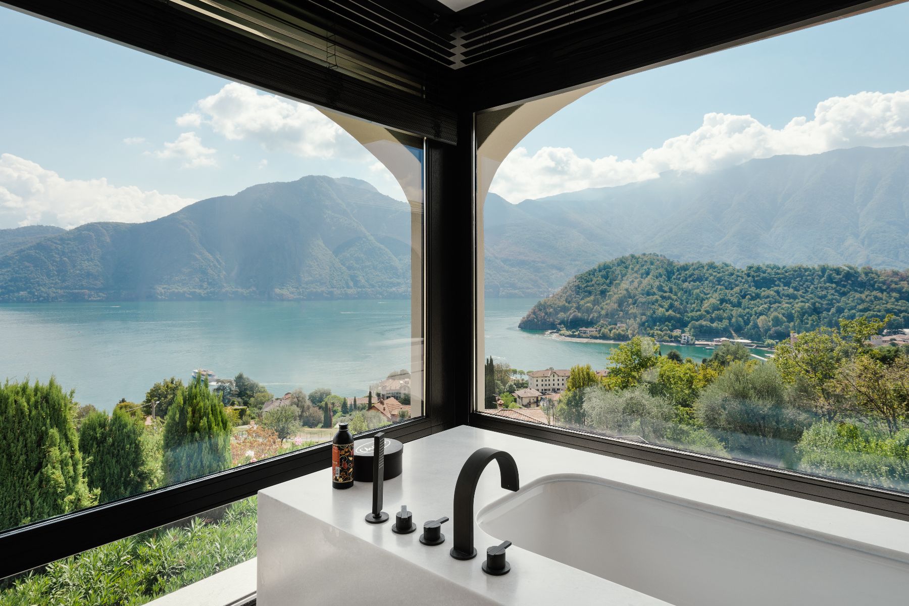 Bathroom with views over Lake Como at private rental Villa Pola in the Italian Lakes, Italy