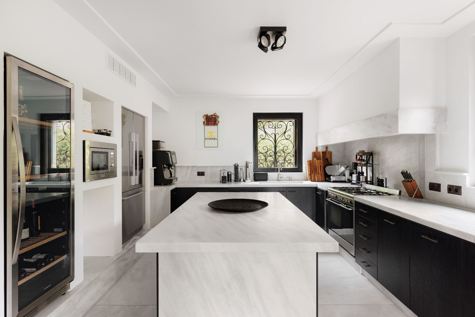 Contemporary black and white kitchen at private vaction rental Villa Pola on Lake Como in the Italian Lakes, Italy