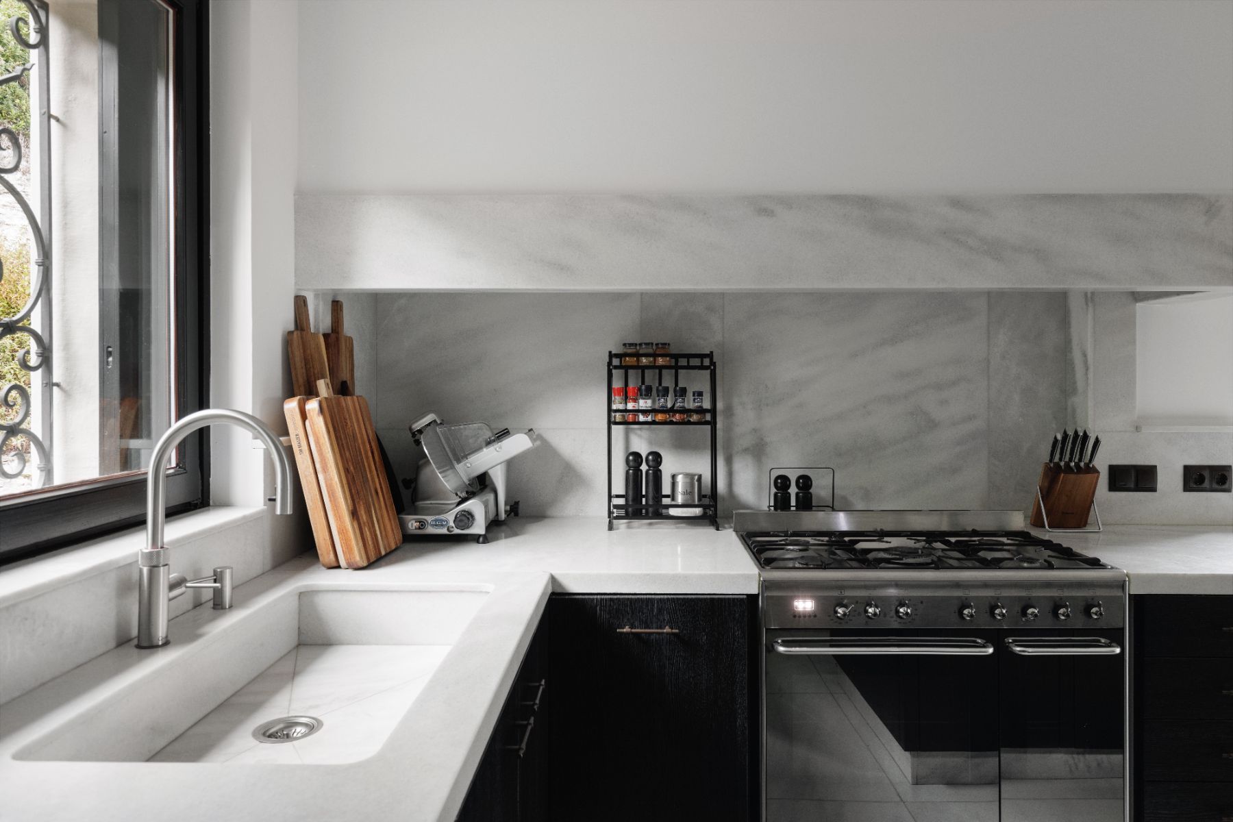 Contemporary black adn white kitchen at private vacation rental, Villa Pola in the Italian Lakes, Italy