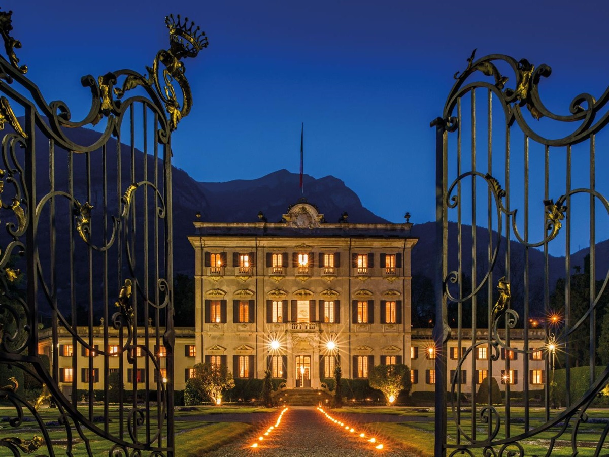 Exterior of Villa Sola Cabiati at night in Lake Como, Italy