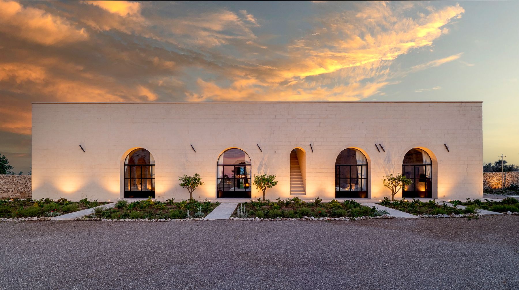 Exterior sunset view of Masseria Salento in Puglia