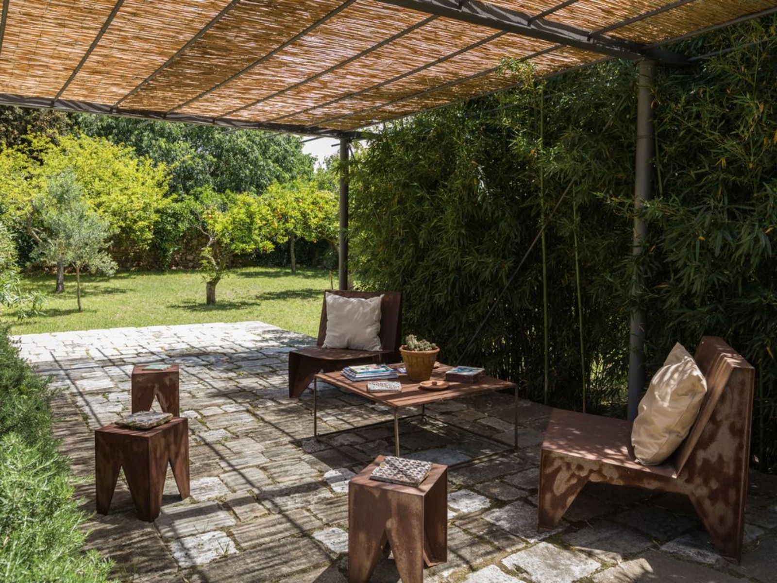 Covered outdoor seating area at Palazzo Isonzo
