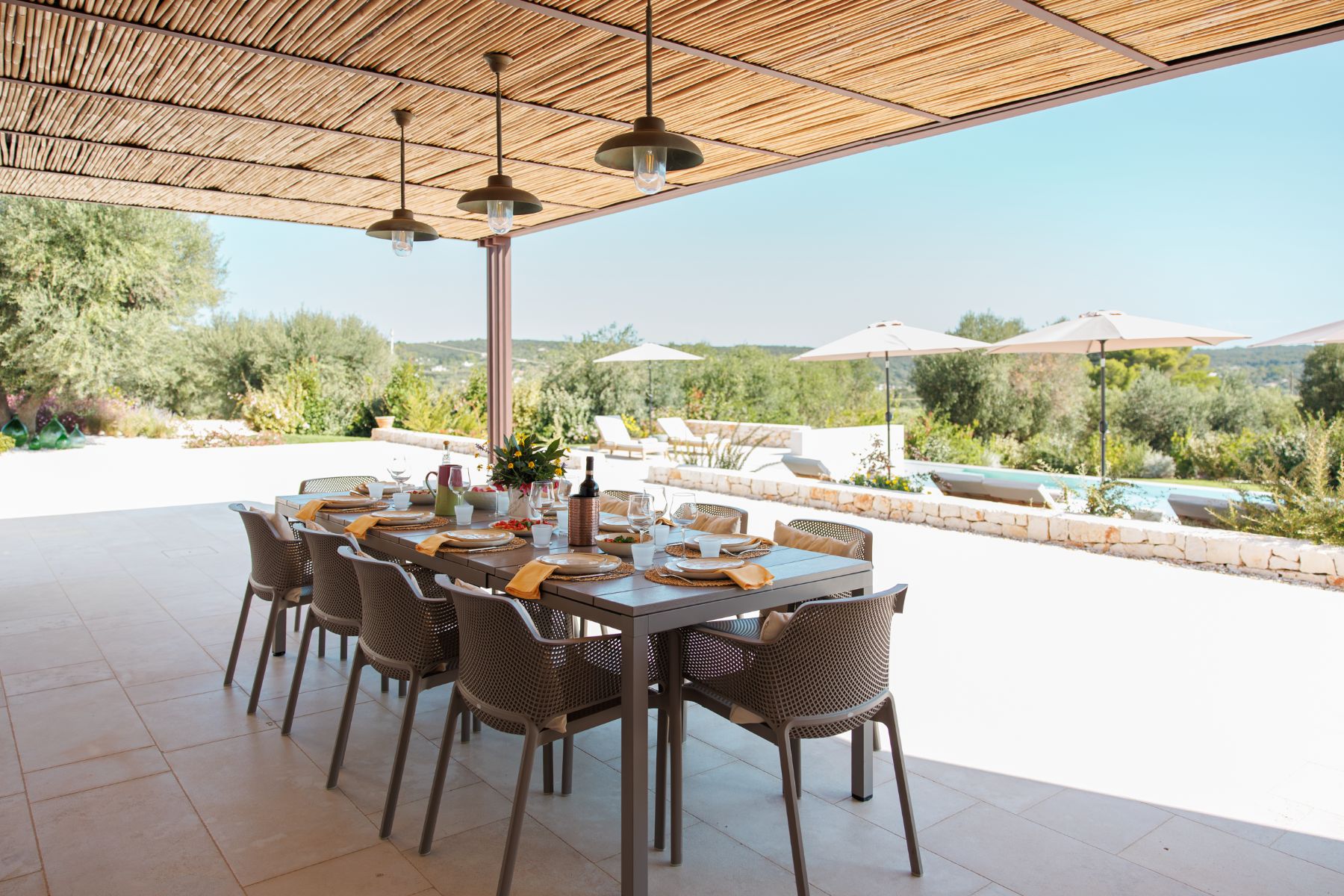Outdoor dining area at Trulli Armonia in Puglia