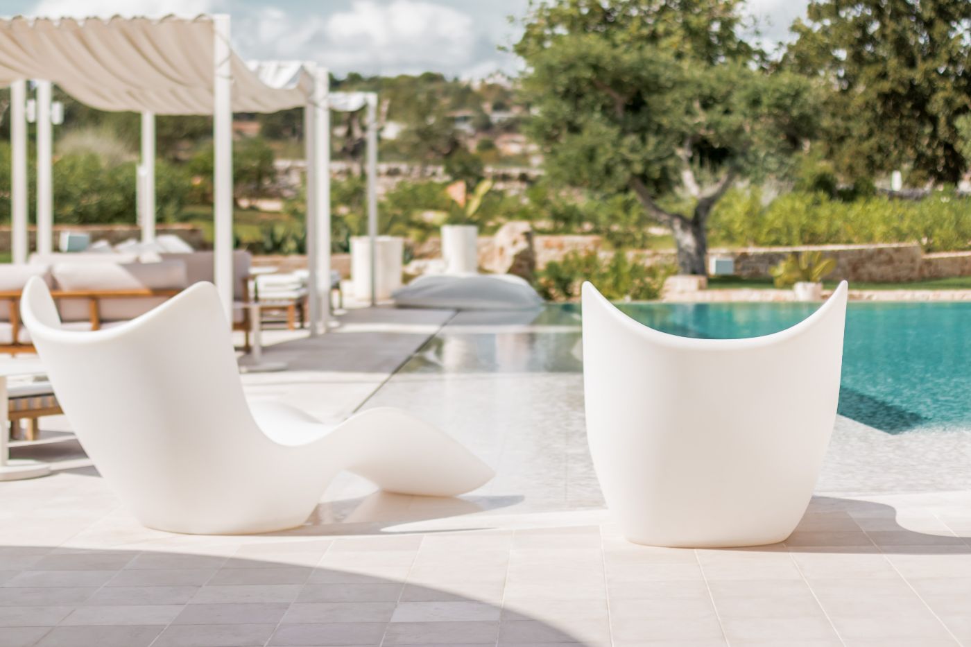 Pool seating space at Trulli Bianca.