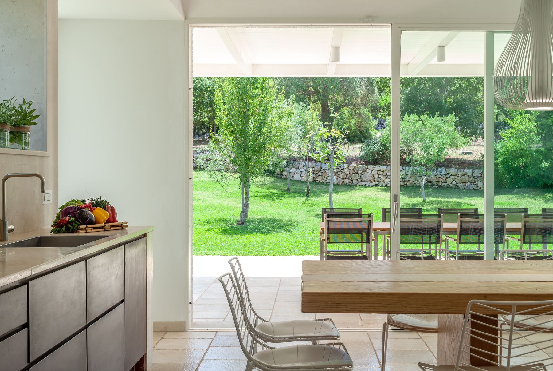 View into garden from kitchen at Trulli Lucia in Puglia