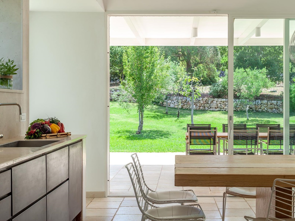 View into garden from kitchen at Trulli Lucia in Puglia