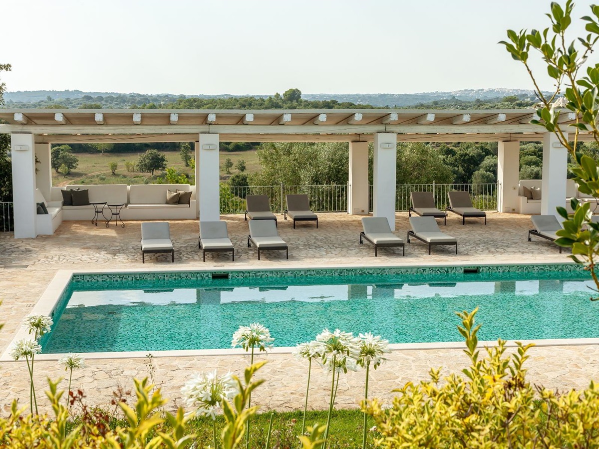 Higher angle of pool and terrace at Trulli Lucia in Puglia