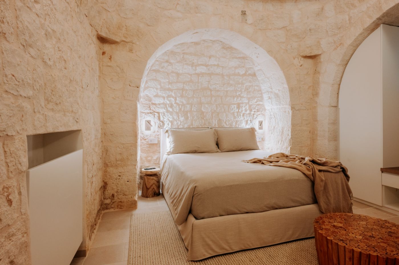 A bedroom at Trulli Pomona.