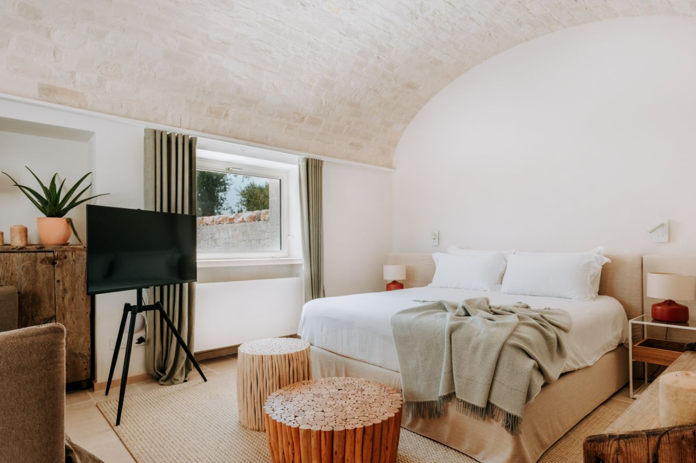 A bedroom at Trulli Pomona.