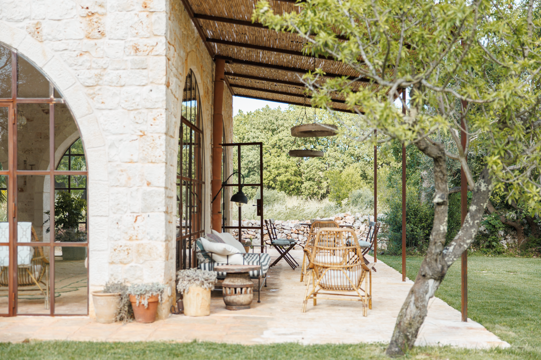 Outdoor seating at Trullo Uliveto