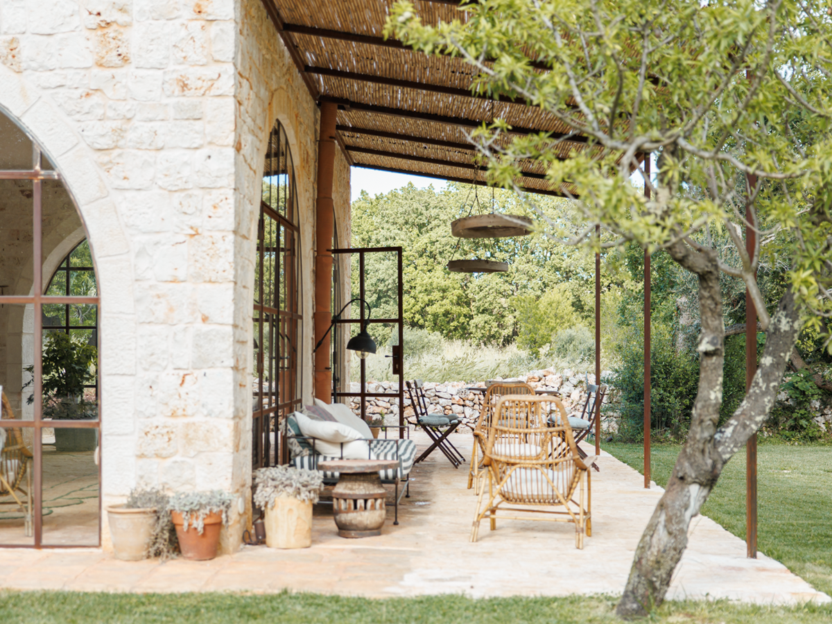 Outdoor seating at Trullo Uliveto