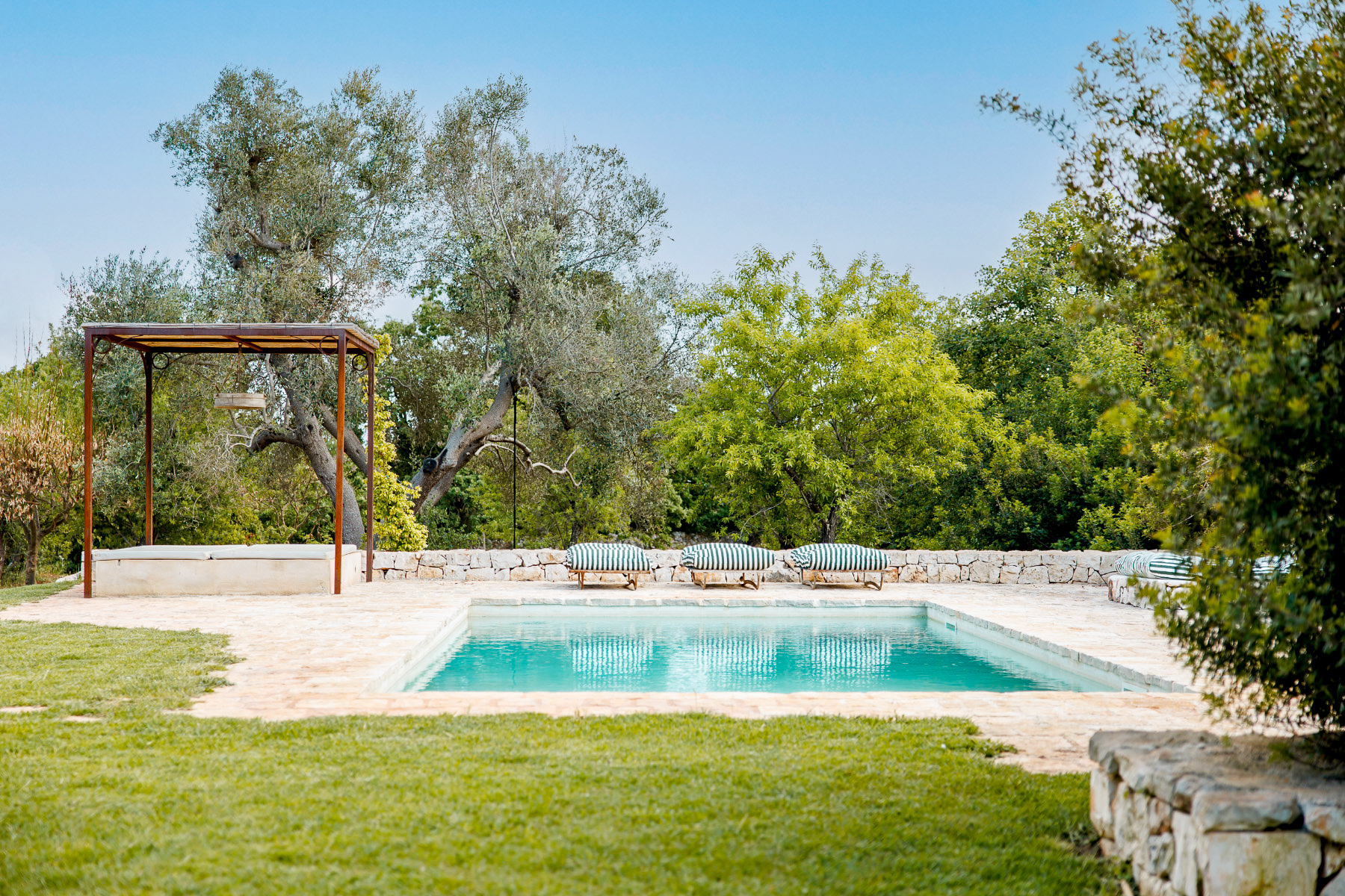 Pool and garden at Trullo Uliveto, Puglia