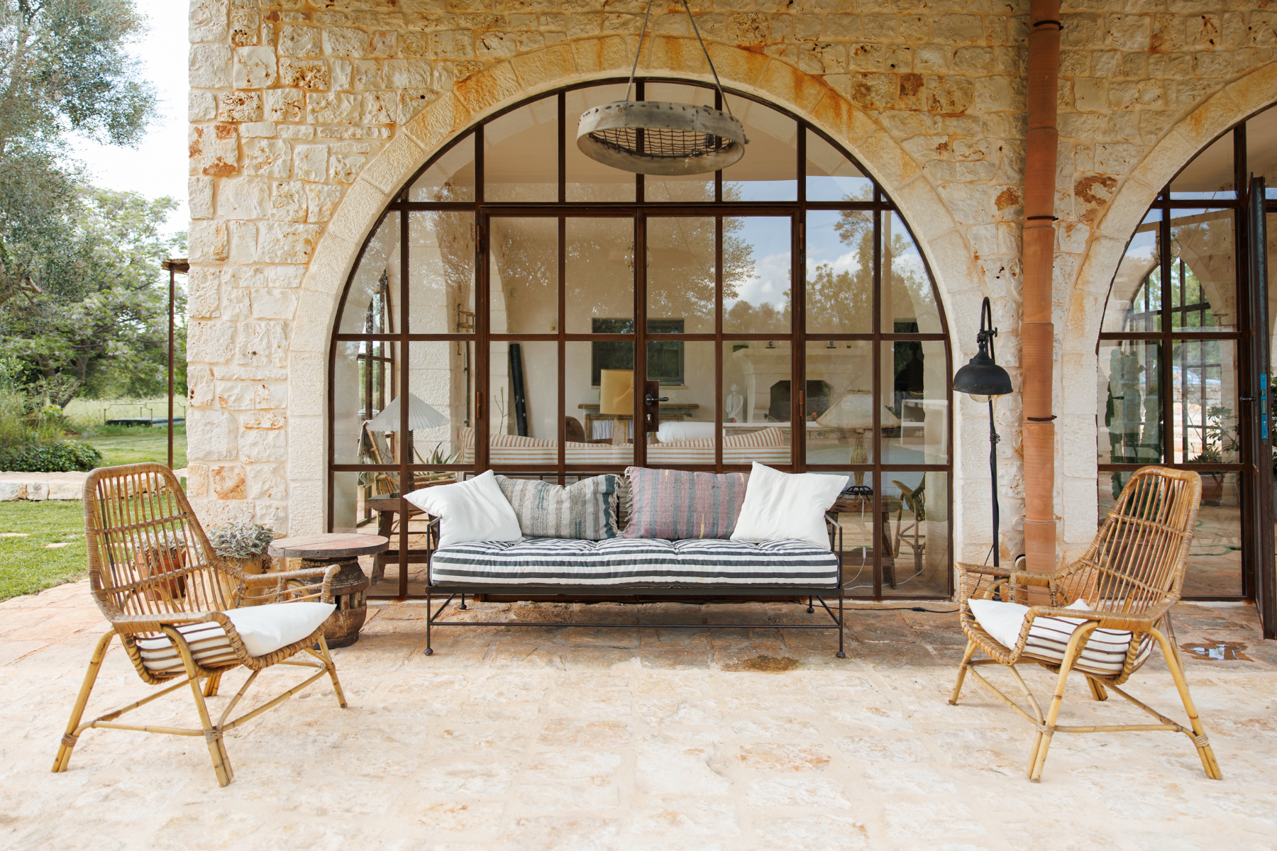 Outdoor seating at Trullo Uliveto