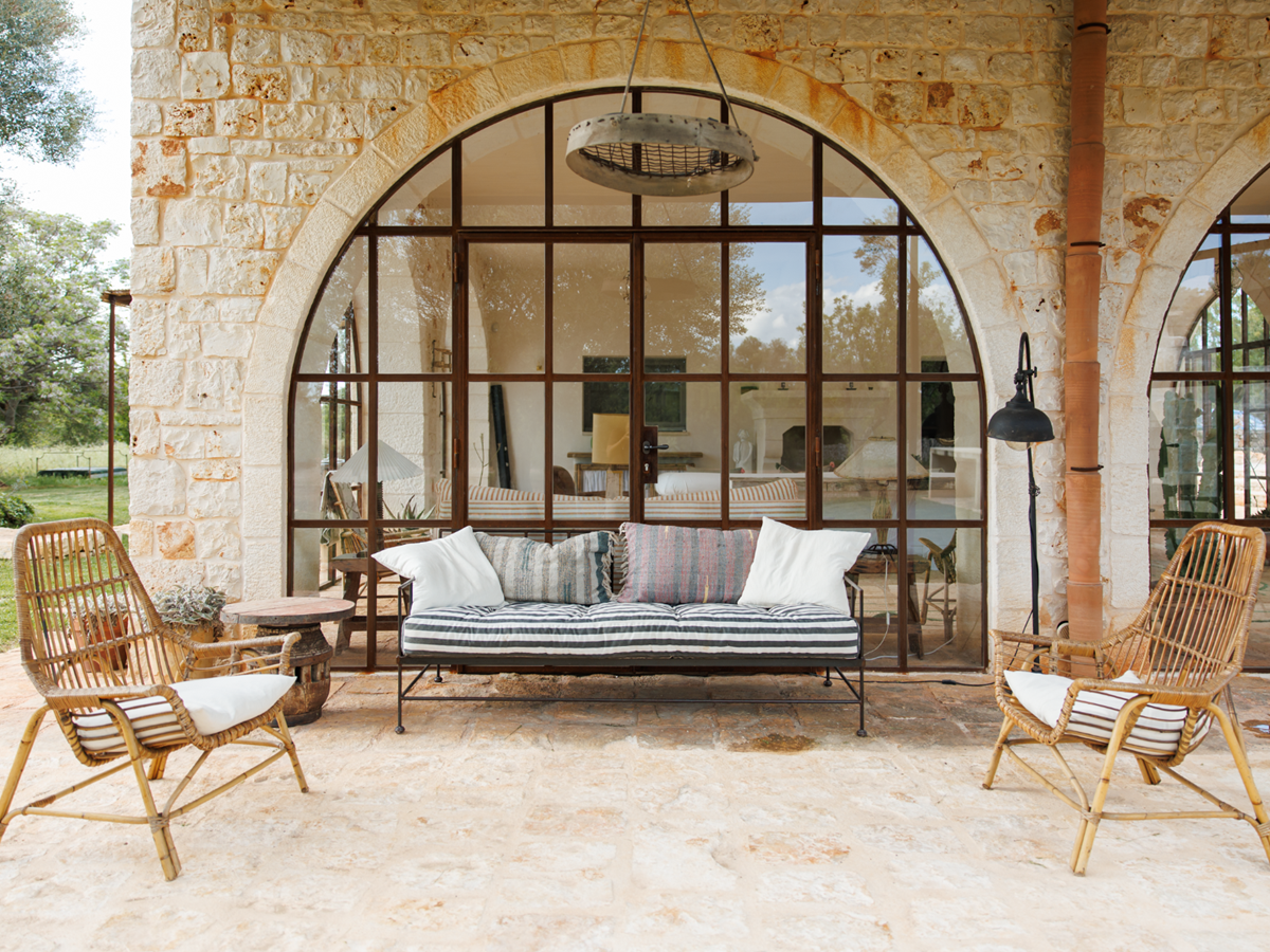 Outdoor seating at Trullo Uliveto