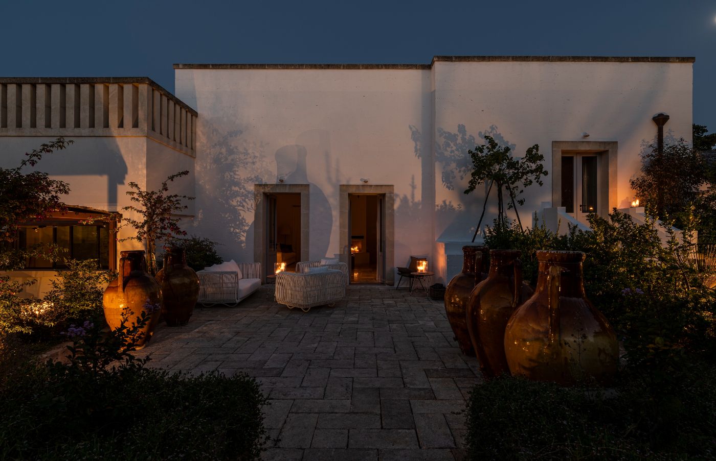The exterior of Villa Alberi at night.