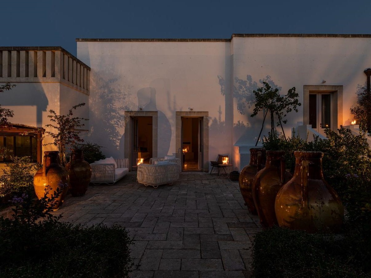 The exterior of Villa Alberi at night.