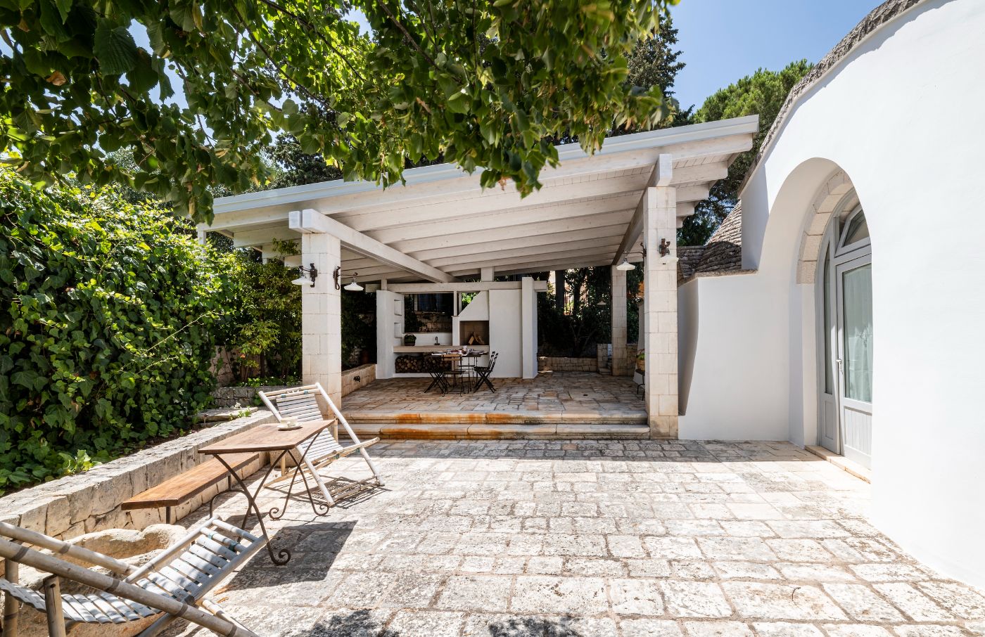 An outdoor patio area at Villa Alberi.