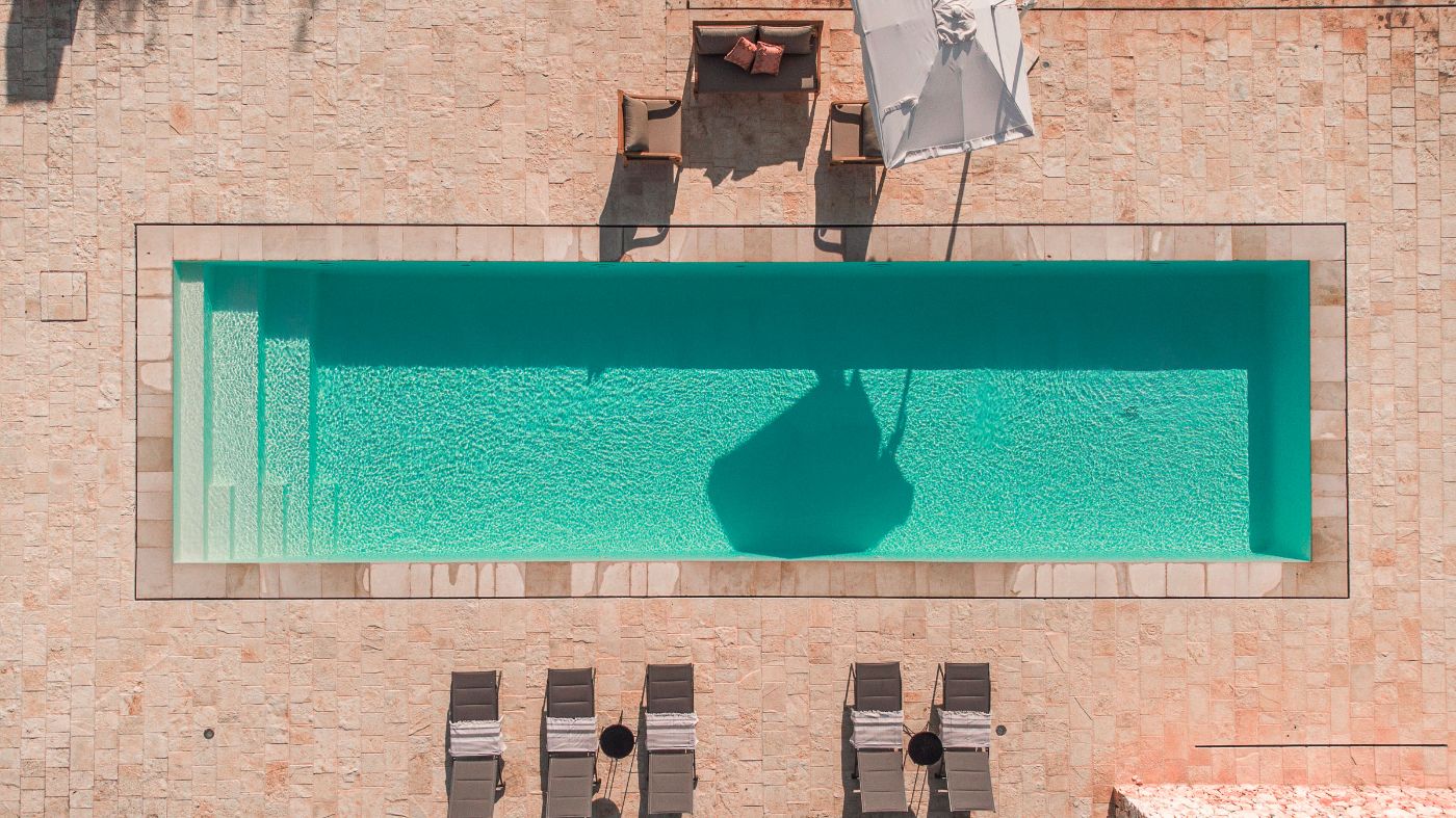 A bird's eye view of the swimming pool at Villa Ambra.