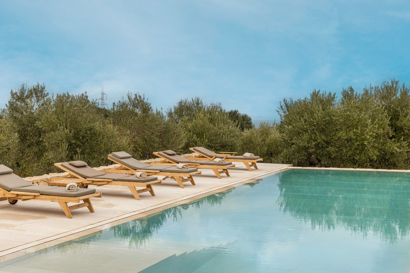 Pool loungers at Villa Venere in Puglia