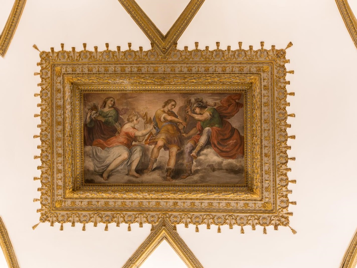 ceiling artwork with elaborate gold border at costaguti apartment, Rome