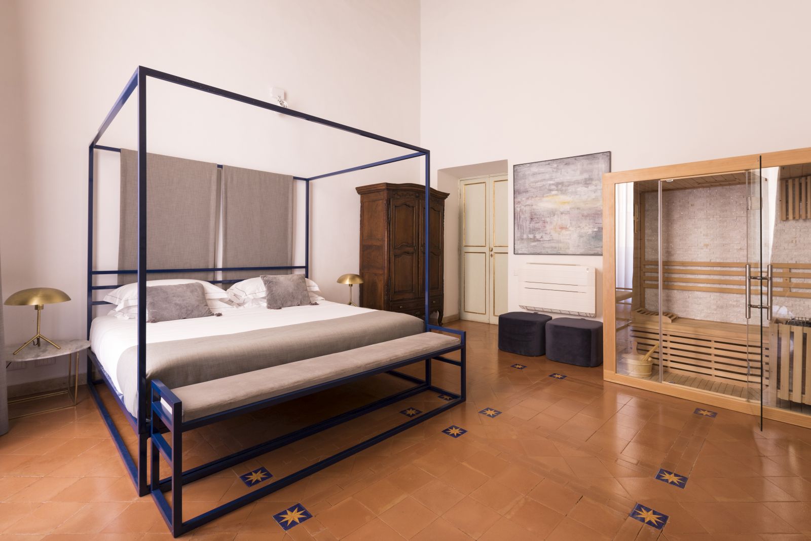 a king bedroom with sauna