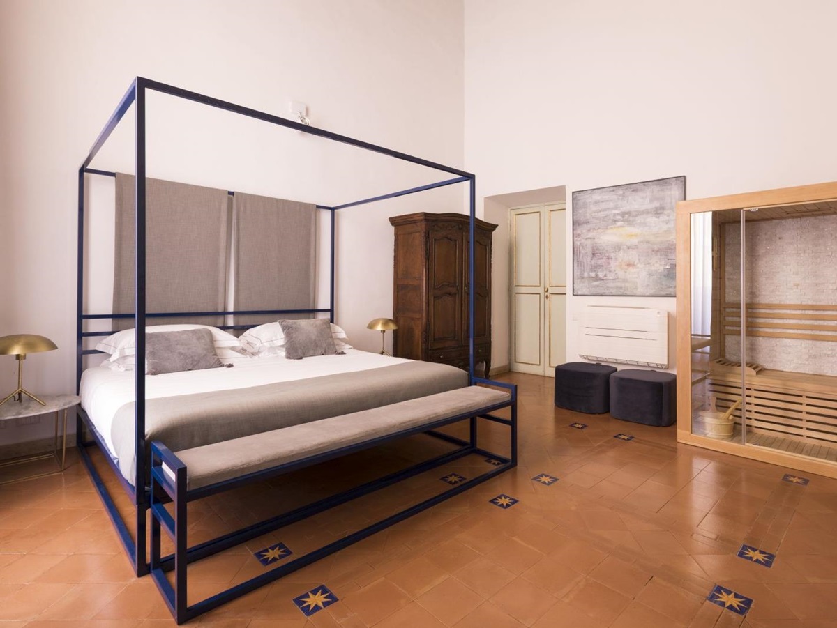 a king bedroom with sauna