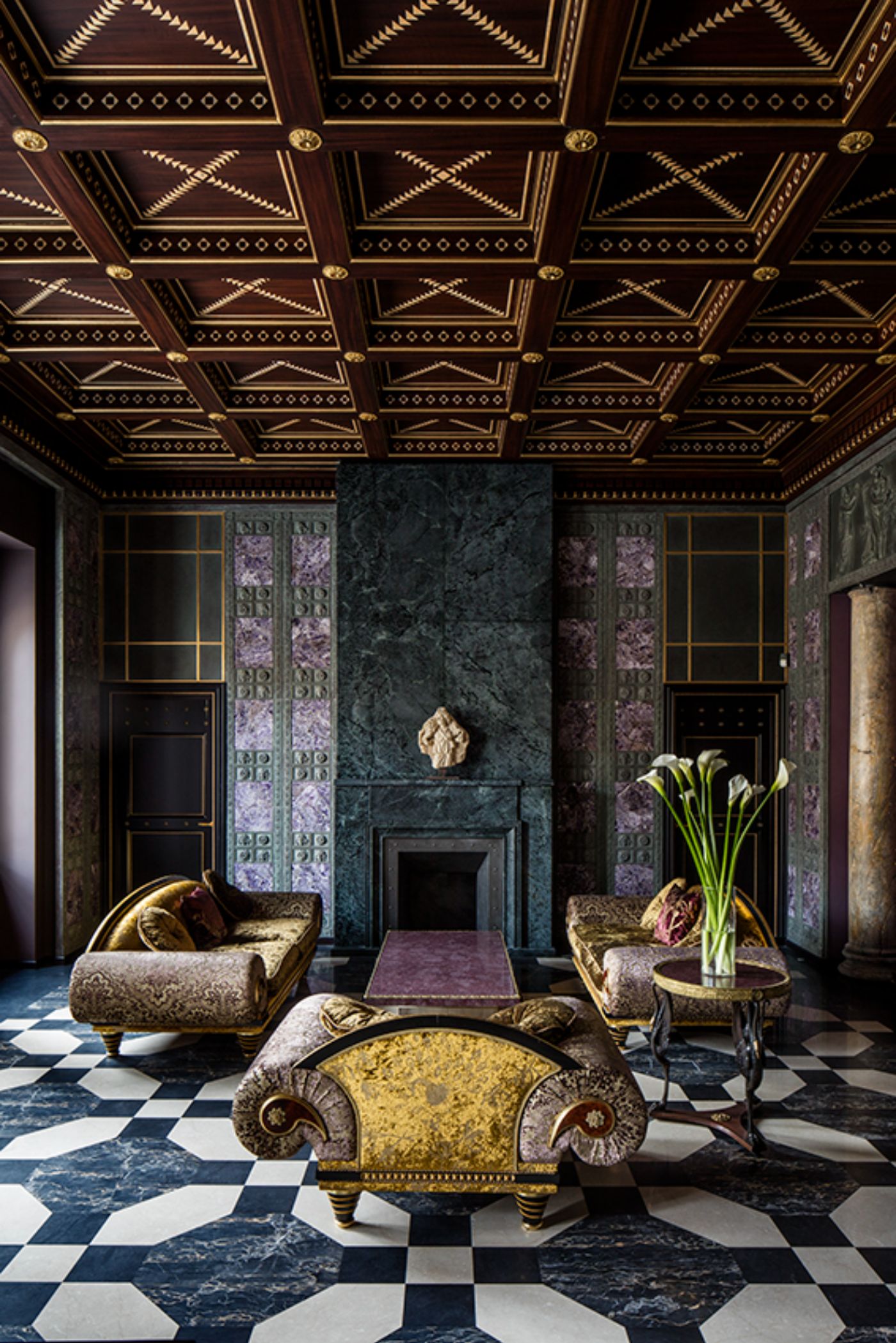 Armchairs surrounding a coffee table in a living room of Villa Clara.