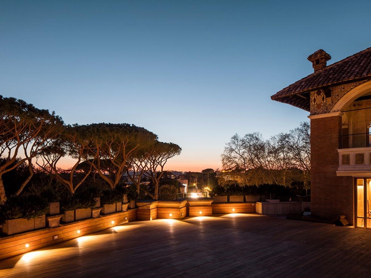 The large rooftop terrace at sunset at Villa Clara.