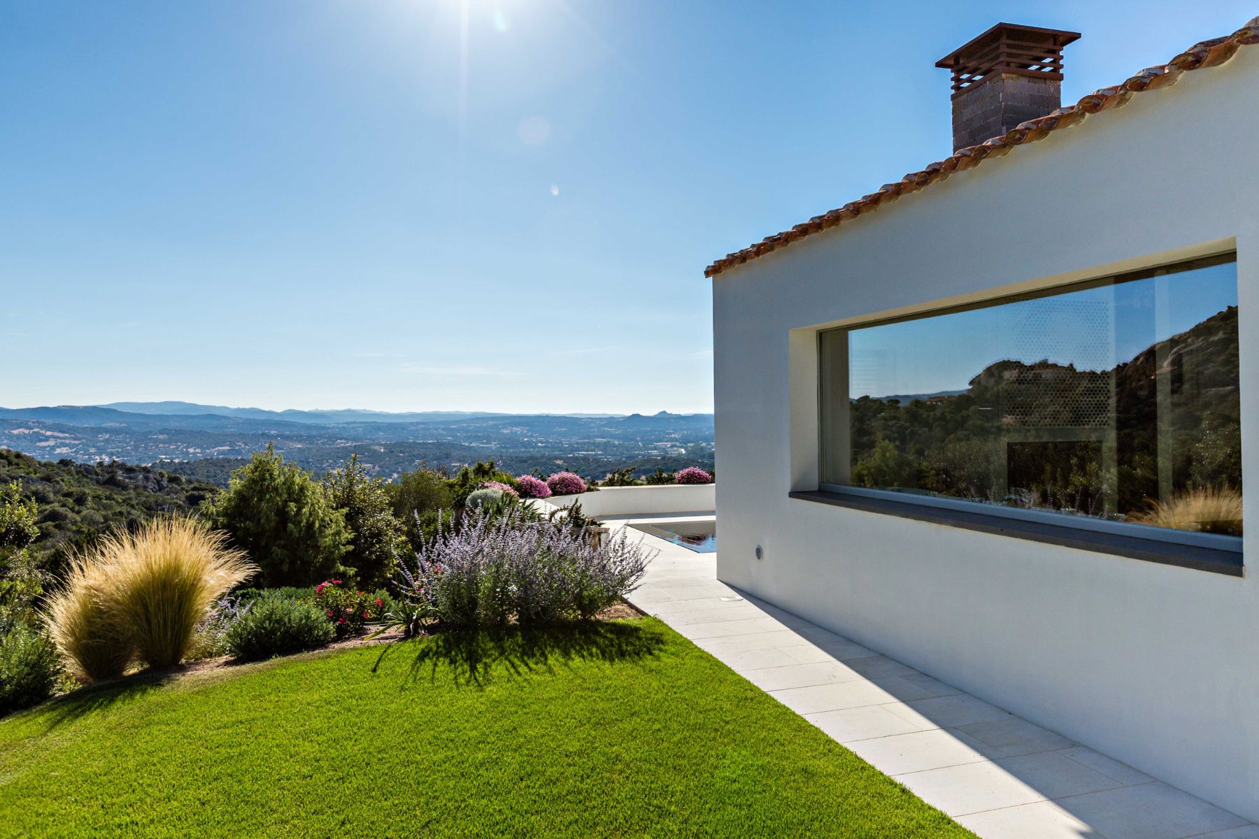 View of Il Parrici villa outdoor, with view of the pool and trees