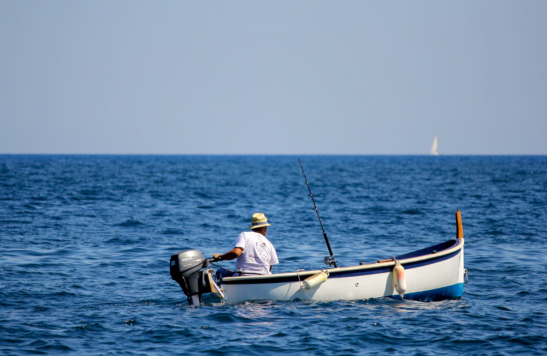 A fisherman at work off the coast of Sicily