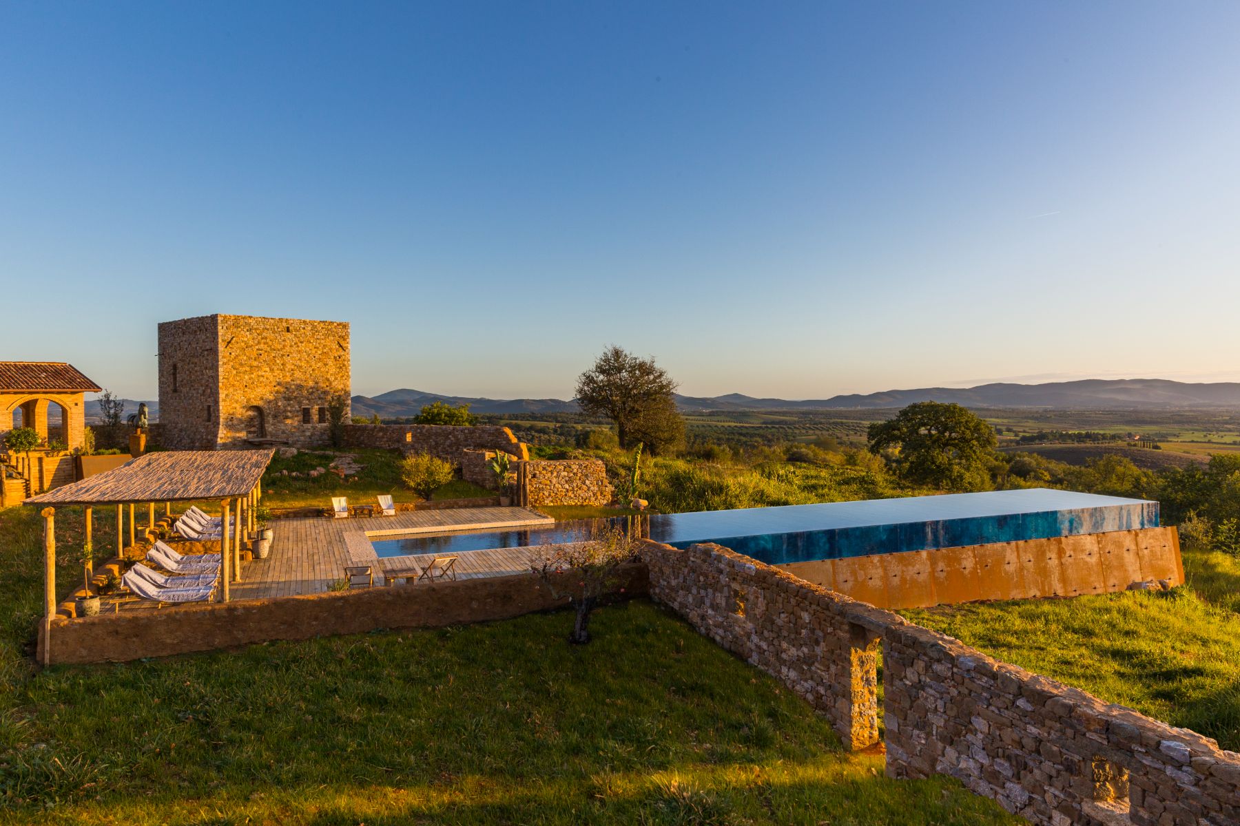 Aerial pool view at Borgo Rinato in Tuscany