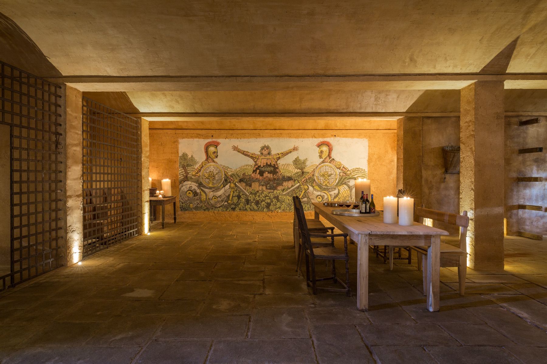 Cellar and dining table at Borgo Rinato in Tuscany